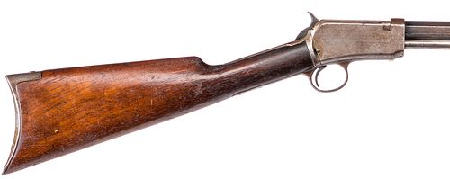 Winchester model 1890 slide action take down rifle