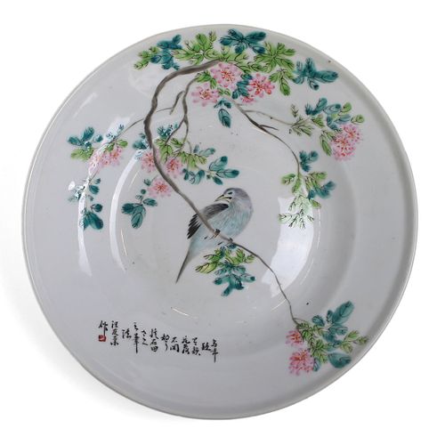 A CHINESE FAMILLE-ROSE ‘FLORAL AND BIRD’ DISH