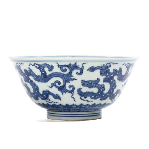 A CHINESE BLUE AND WHITE ‘DRAGON’ BOWL