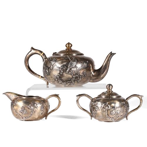 A SET OF CHINESE SILVER TEA WARE
