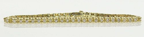 Lady's Diamond and 14 Karat Yellow Gold Tennis Bracelet.