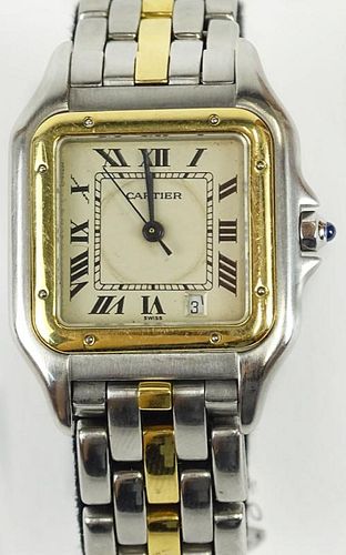 Lady's vintage Cartier 18 karat yellow gold and stainless steel two tone Panthere watch with quartz movement.