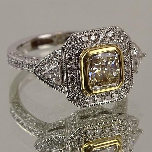 Lady's Approx. 1.01 Carat Fancy Yellow Diamond, 1.57 Carat Round Cut Diamond and 18 Karat White Gold Ring