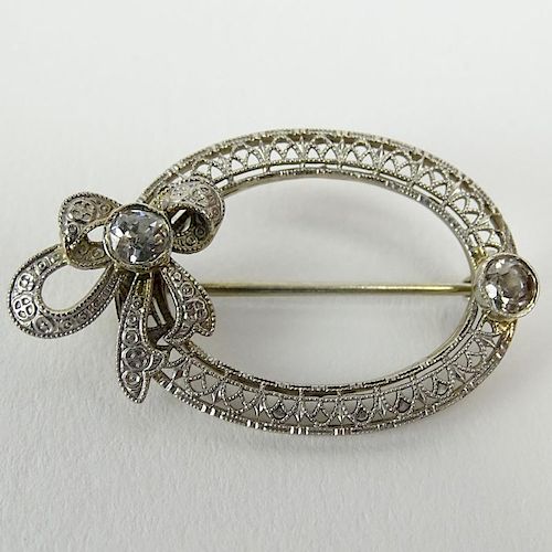 Lady's Antique 14 Karat White Gold Brooch set with approx. .50 Old European Cut Diamonds.