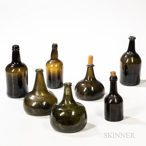 Seven Early Blown Glass Bottles