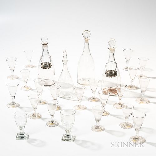 Four Wheel-engraved Decanters and Twenty-one Blown Wines