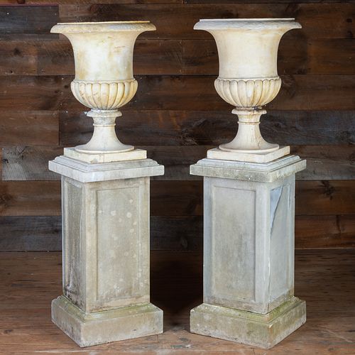 Pair of Cast Terracotta Campana Urns on Stone Pedestals