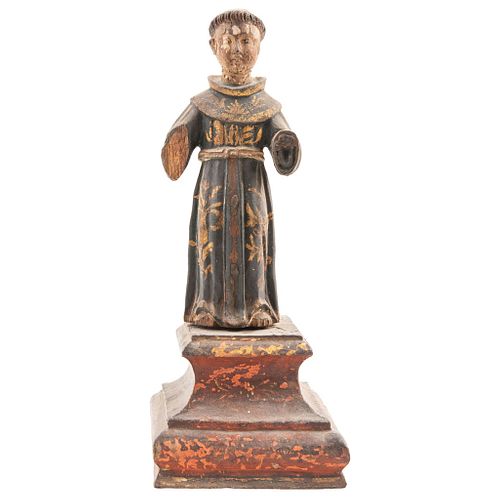 ST ANTHONY OF PADUA MEXICO, 18TH CENTURY Polychrome wood carving. Includes base. 10.8" (27.5 cm) tall