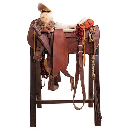 FAENA SADDLE MEXICO, 20TH CENTURY Smooth square skeleton saddle with "Silao" style shaft