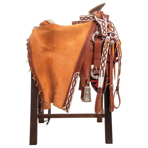 HALF GALA CHARRO SADDLE  MEXICO, 20TH CENTURY Complete set of saddle with chap skirt