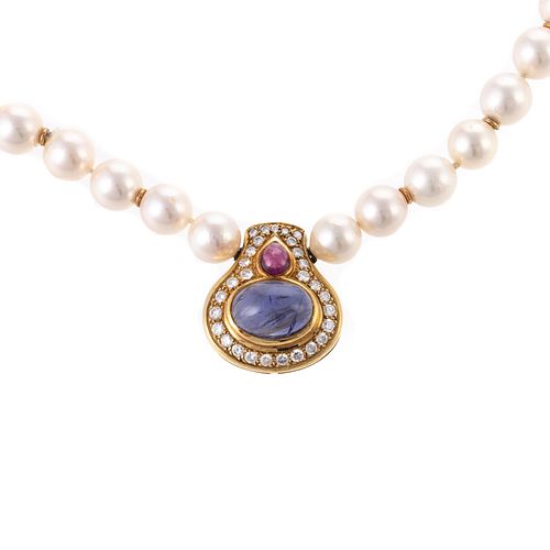 A Pearl Necklace with Ruby & Iolite Pendant