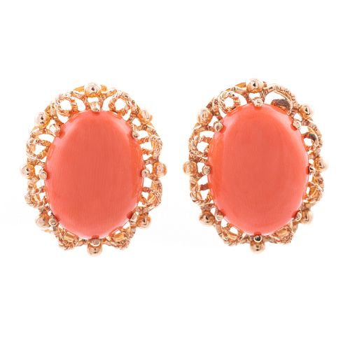 A Pair of Oval Coral Earrings with 14K Frames