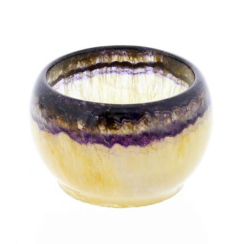 A Blue John bowl Of hemispherical form with parallel rim banding over a body of  'vaseline' hue, 59m