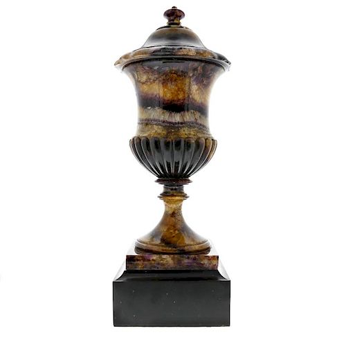 A superb Regency Blue John campana-form urn and cover Early 19th century The spreading cover with co