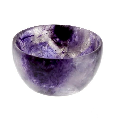 A small Blue John bowl Of hemispherical form with a pale lilac band between darker patches, 40mm dia
