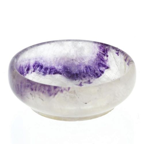 A Blue John bowl Of shallow circular form, the 'milky' ground with an arc of purple veining to much