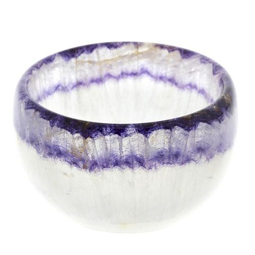 A small Blue John bowl. Of hemispherical form with parallel rim banding, 41mm diameter x 24mm high,