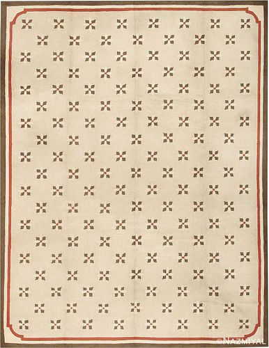 EARLY AMERICAN TUFTED RUG. 15 ft 4 in x 11 ft 10 in (4.67 m x 3.61 m).