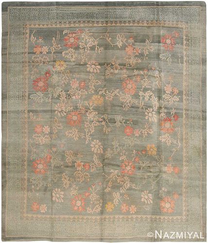 VINTAGE NEPALESE FLORAL RUG. 9 ft 3 in x 7 ft 10 in (2.82 m x 2.39 m).