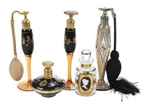 Five Black and Gilt Perfume and Atomizer Bottles