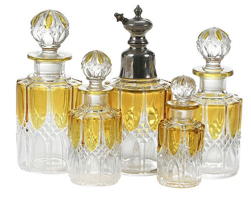 Five Piece Clear and Amber Glass Dresser Set