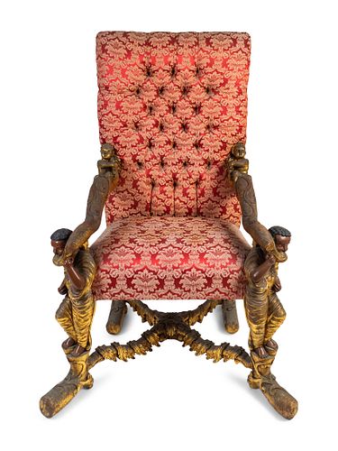 An Italian Baroque Style Carved Walnut Figural Armchair
Height 62 x width 36 x depth 30 inches.