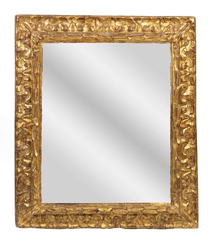 An Italian Baroque Giltwood Mirror
Height 44 x width 38 inches.