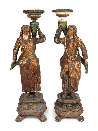A Pair of Italian Baroque Parcel-Gilt and Polychromed Figures
Height 58 1/2 x width 20 x depth 14 inches.