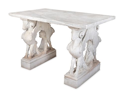 An Italian Carved Marble Table
Height 38 x length 60 x depth 36 inches.