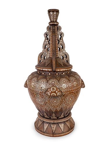 A Monumental Near Eastern Mother-of-Pearl-Inlaid Covered Jar
Height 42 x diameter 22 inches.