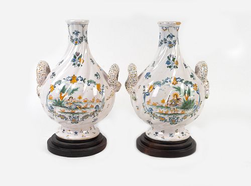 A Pair of French Faience Two-Handled Vases
Height 12 x width 9 inches.