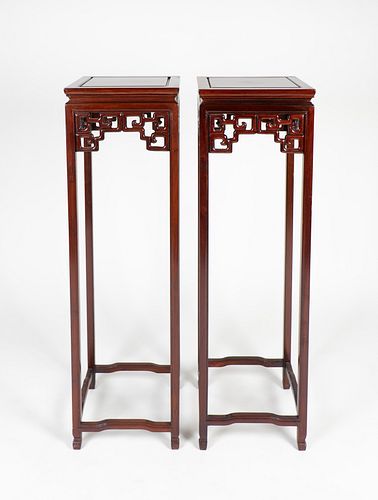 A Pair of Chinese Rosewood Stands
Height 48 x width 14 x depth 14 inches.