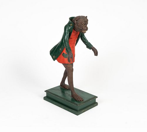 A Continental Polychromed Wood Figure of a Monkey
Height 24 x length 13 x depth 8 inches.