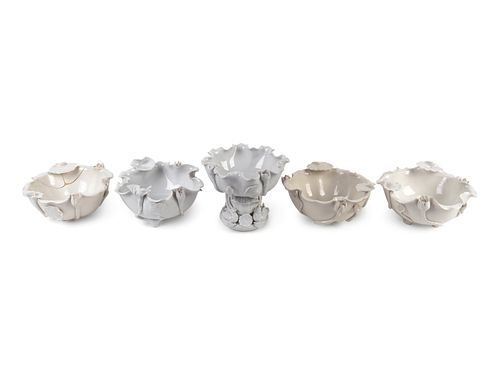 Five Chinese Blanc de Chine Porcelain Lotus Bowls
Heights 4 to 6 3/4 inches; diameters 7 to 8 inches.