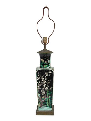 A Chinese Famille Noire Porcelain Vase Mounted as a Lamp
Height excluding fittings 21 x width 6 x depth 6 inches.
