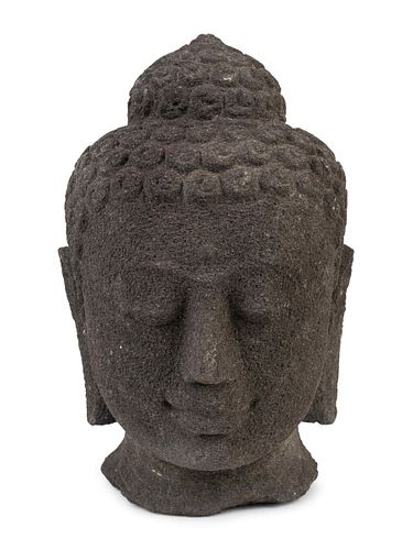 An Indonesian Volcanic Head of a Deity
Height 16 x width 10 x depth 10 inches.
