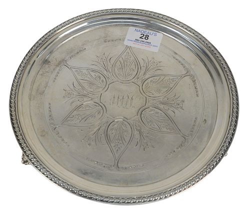 J.E. Caldwell Coin Silver Salver on three feet, diameter 9 inches, 12.9 t.oz. Provenance: From a Newport, Rhode Island historic home, in the same fami
