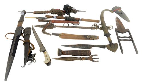 Group of Knives and Daggers to include a Japanese dagger with bone sheath and handle, Middle Eastern daggers, a folding dagger, an Indian knife, etc.,