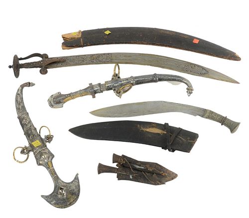 Group of Six Knives and Daggers to include two Middle Eastern daggers with silvered and brass sheath and handle, an Indian sword with jeweled handle a