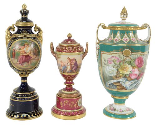 Three Porcelain Urns to include two Royal Vienna and one Copeland, heights 9, 11 1/2 and 11 3/4 inches.