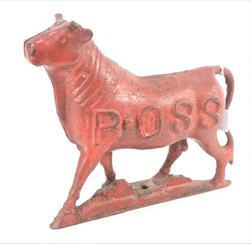 Boss Steer Cast Iron Windmill Weight, painted red and marked Boss on each side, height 12 inches, width 4 inches, length 14 inches.