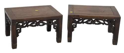 Pair of Chinese Hardwood Stands having carved apron, height 9 3/4 inches, top 12" x 16 1/4".
