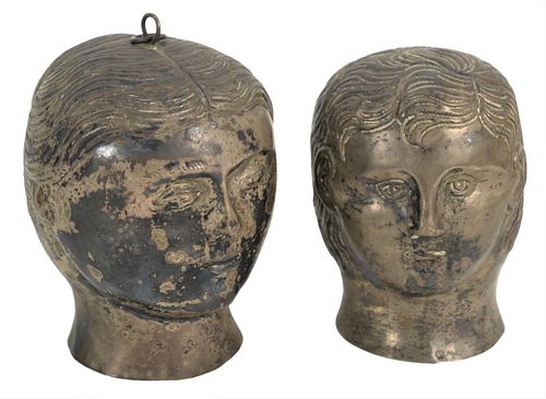Pair of Silver Heads in the form of a man and woman, possibly stirrup cup or dolls head, 19th century, hallmarks, height 4 3/4 inches, and 4 1/2 inche