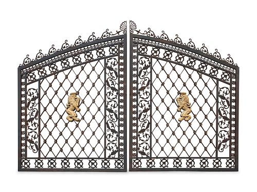 A Pair of Gates with Gilt Rampant Lion Ornaments
Height of each gate 107 x width 78 1/2 inches per side, total of 157 inches.