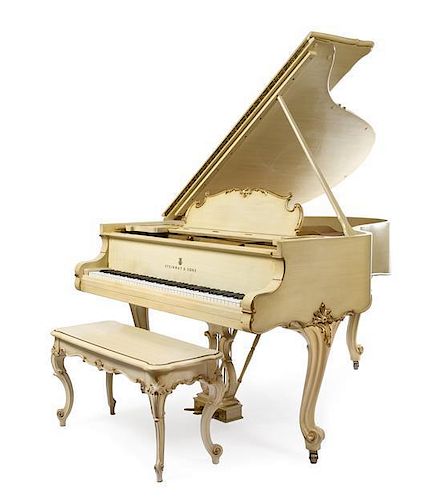 A Steinway & Sons Baby Grand Piano Height 39 x width 61 x depth 71 inches.