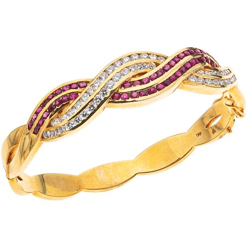 BRACELET WITH RUBIES AND DIAMONDS IN 18K YELLOW GOLD with 48 round cut rubies ~1.44 ct and 47 brilliant cut diamonds ~2.0 ct
