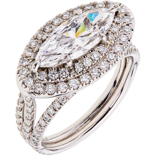 RING WITH DIAMONDS IN PLATINUM 1 marquise cut diamond ~1.67 ct Clarity: VS2 and 132 brilliant cut diamonds ~1.0 ct. Size: 6