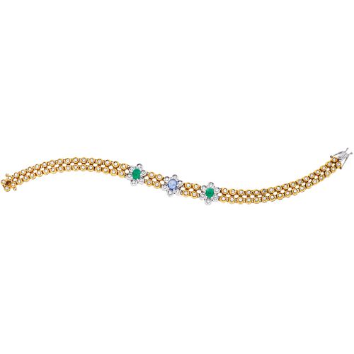 BRACELET WITH SAPPHIRE, EMERALDS AND DIAMONDS IN WHITE AND YELLOW 18K GOLD 1 sapphire ~0.50 ct, 2 emeralds ~0.90 ct and 94 diamonds