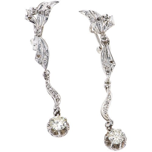 PAIR OF EARRINGS WITH DIAMONDS IN PALLADIUM SILVER with 2 brilliant cut diamonds ~1.0 ct. Clarity: I1-I3 Color: J-K and 28 diamonds
