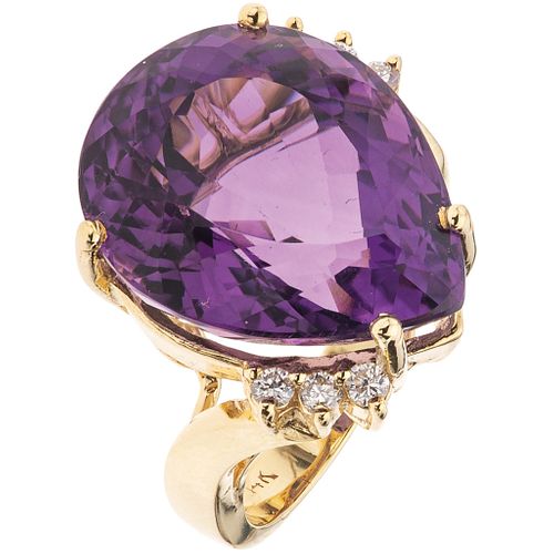 RING WITH AMETHYST AND DIAMONDS IN 14K YELLOW GOLD 1 pear cut amethyst ~17.20 ct and 6 brilliant cut diamonds ~0.18 ct